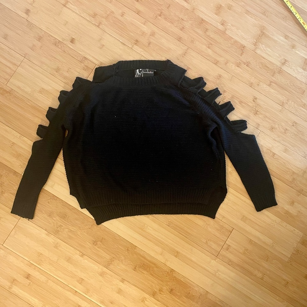 Chandelier lightly worn open shoulder black sweater